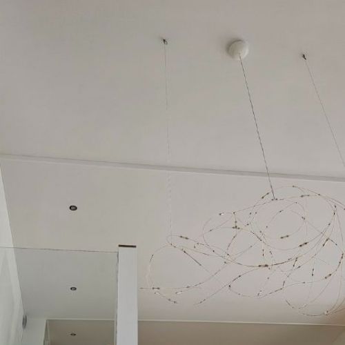 Plafond acoustique - pièce de vie de grande hauteur et mezzanine